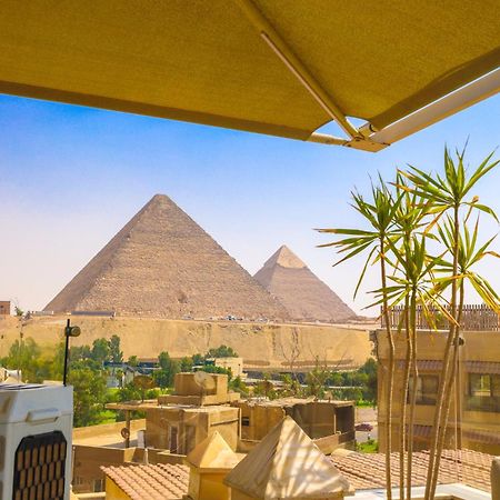 Onyx Pyramids Boutique Hotel Al Kawm al Akhdar ภายนอก รูปภาพ