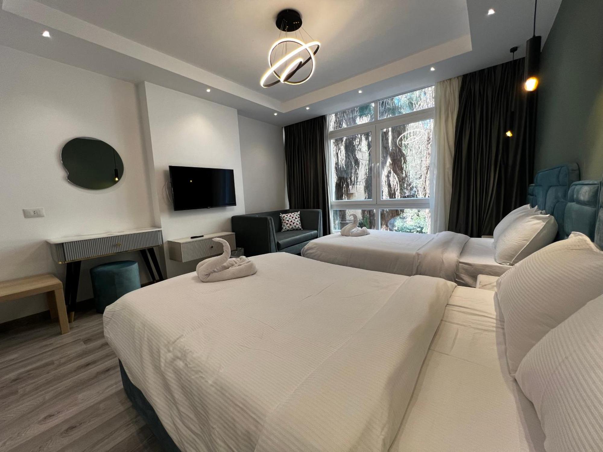 Onyx Pyramids Boutique Hotel Al Kawm al Akhdar ภายนอก รูปภาพ