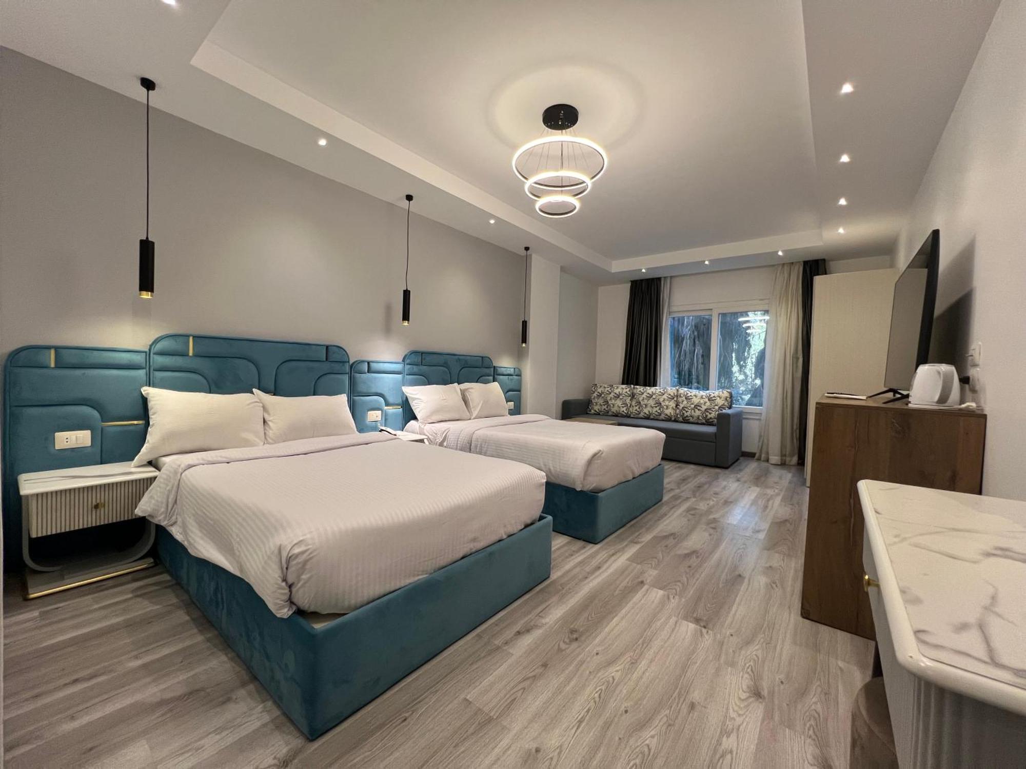 Onyx Pyramids Boutique Hotel Al Kawm al Akhdar ภายนอก รูปภาพ
